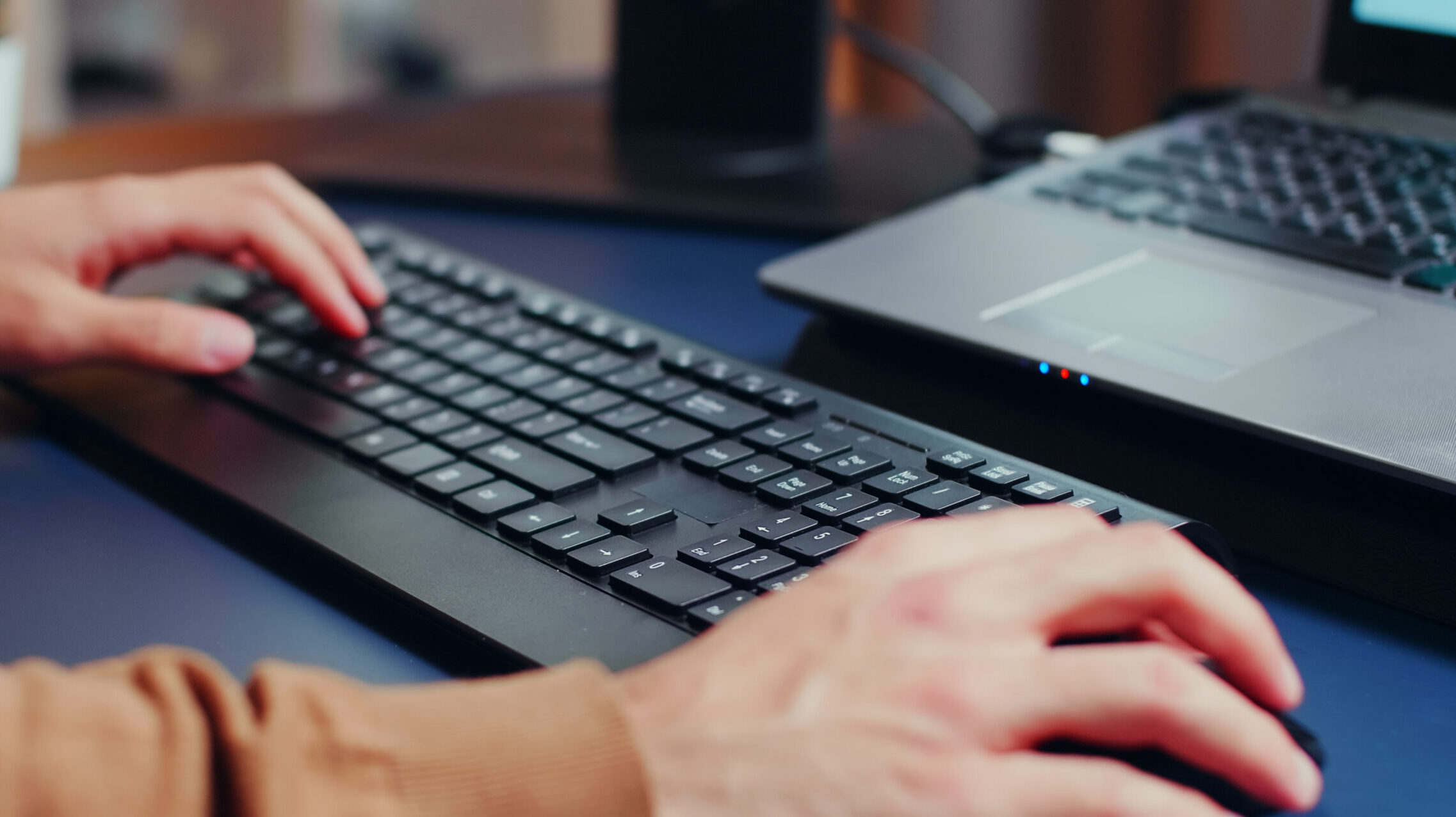 Close up of engineer hands typing on keyboard